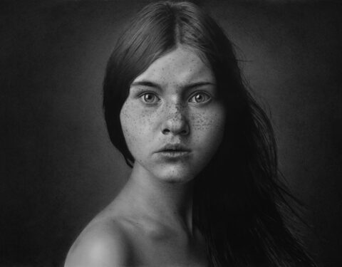 Photorealistic graphite and charcoal drawings